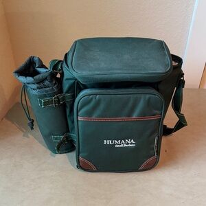 Green Picnic Cooler with Cheese Board and Wine Accompaniment